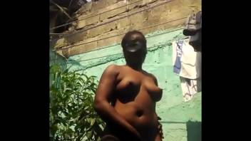 Jamaican woman naked in my garden